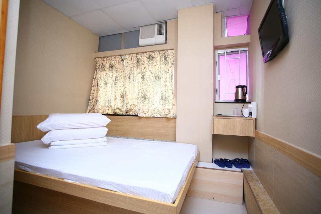 Kam Fu Guesthouse Цзюлун Экстерьер фото