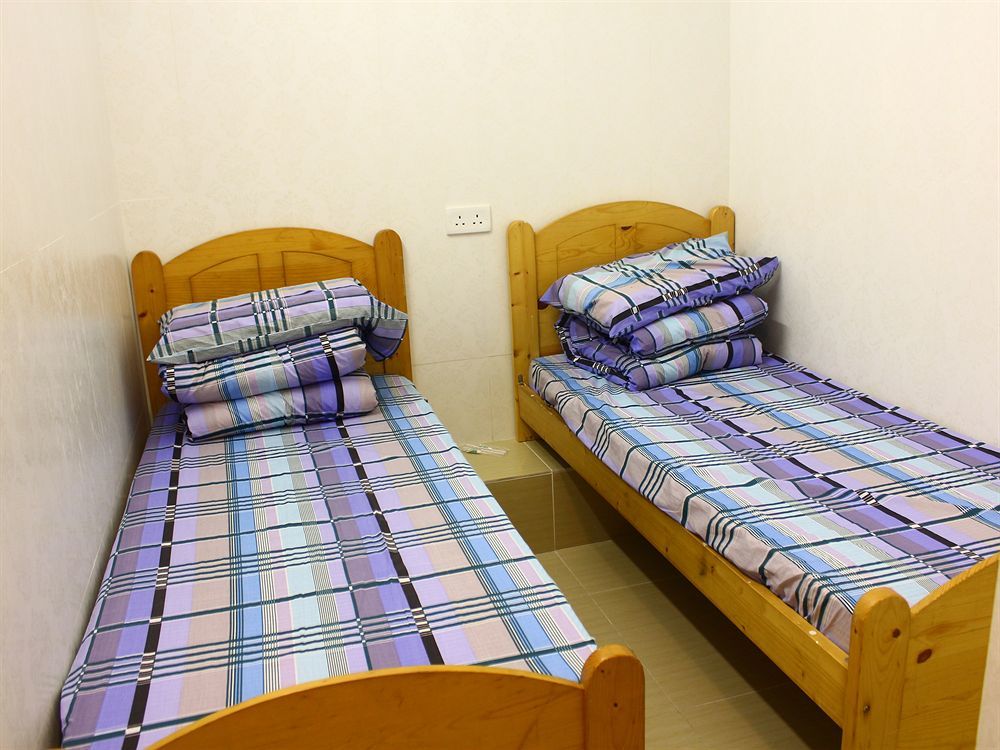 Kam Fu Guesthouse Цзюлун Экстерьер фото