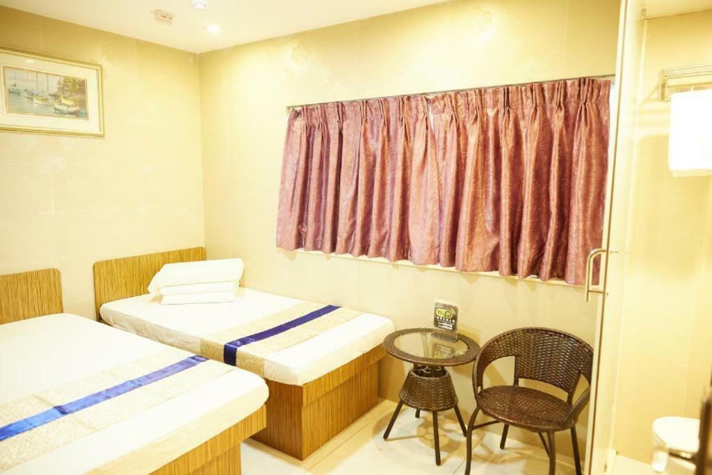 Kam Fu Guesthouse Цзюлун Экстерьер фото