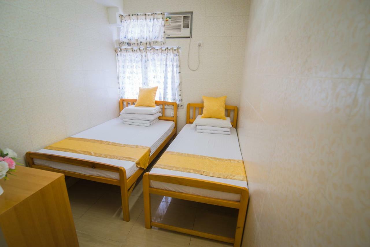 Kam Fu Guesthouse Цзюлун Экстерьер фото