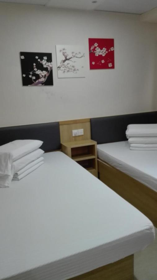 Kam Fu Guesthouse Цзюлун Экстерьер фото
