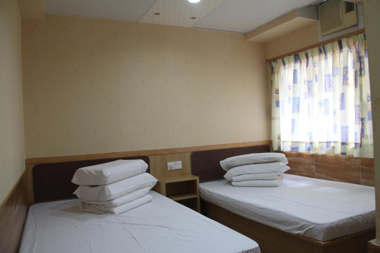 Kam Fu Guesthouse Цзюлун Экстерьер фото