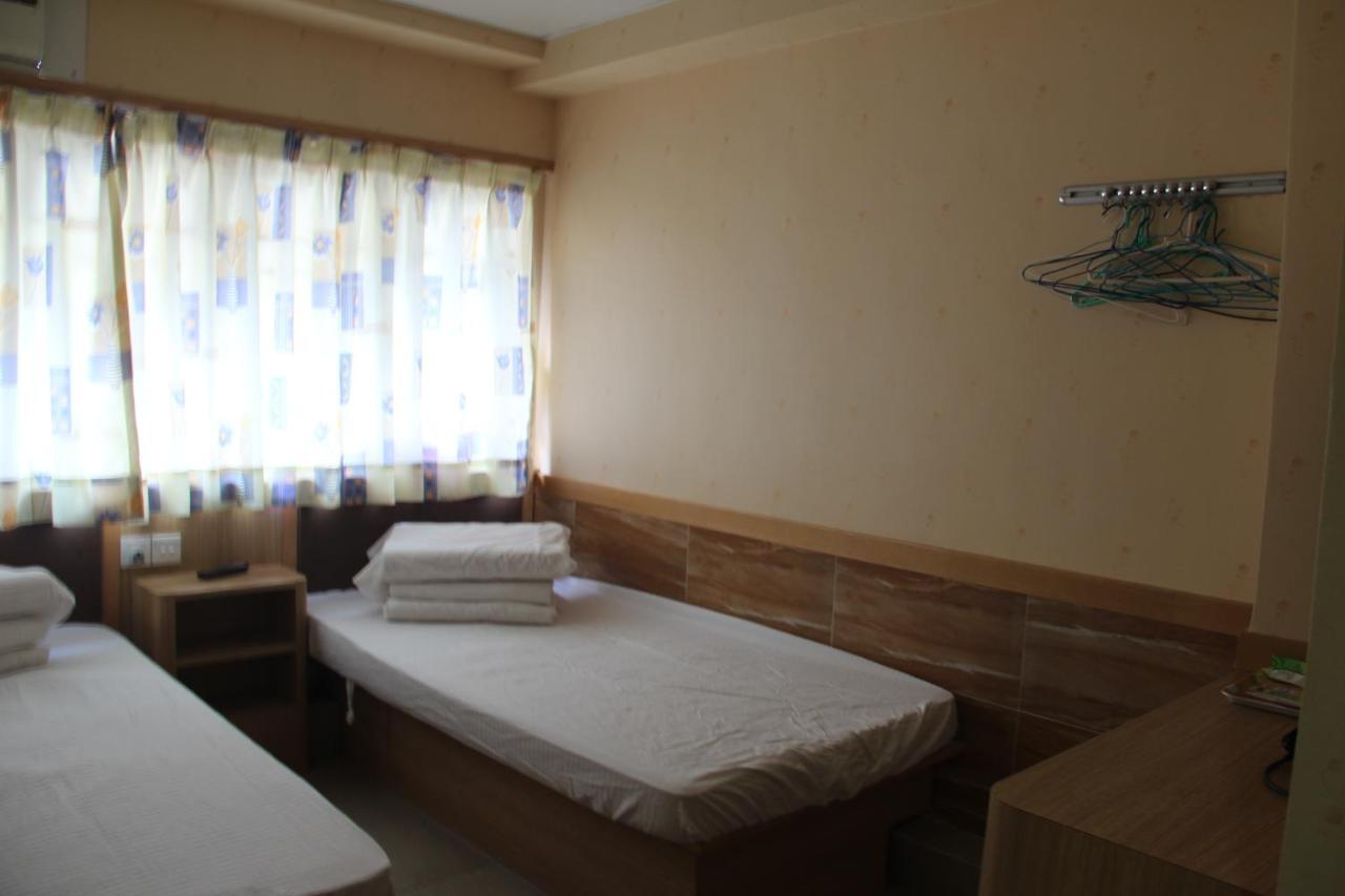 Kam Fu Guesthouse Цзюлун Экстерьер фото
