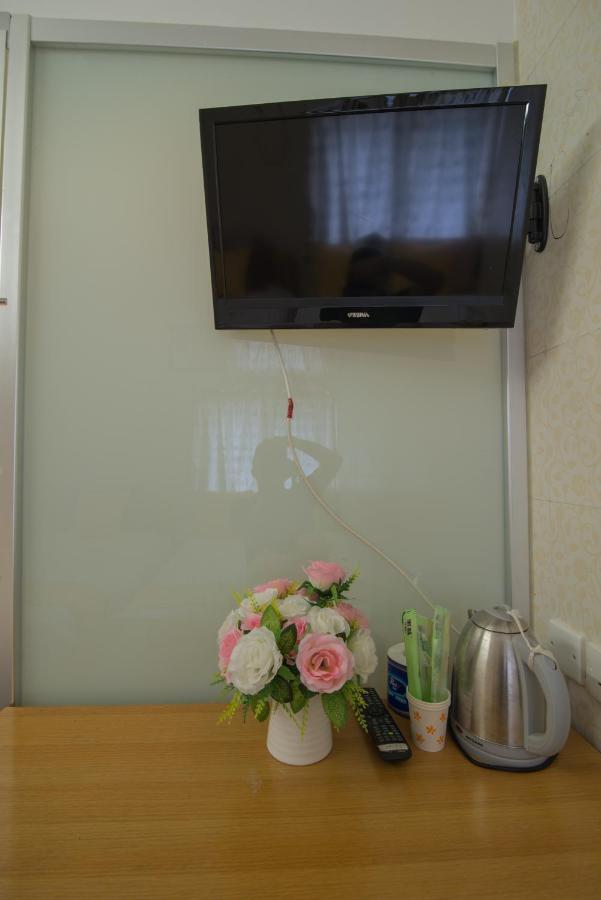 Kam Fu Guesthouse Цзюлун Экстерьер фото